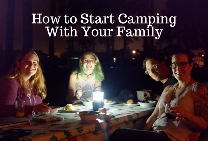 Family Having Dinner in the Dark at a Campground